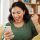 phone-winning-and-celebrate-happy-woman-on-sofa-2025-04-06-09-21-35-utc.jpg